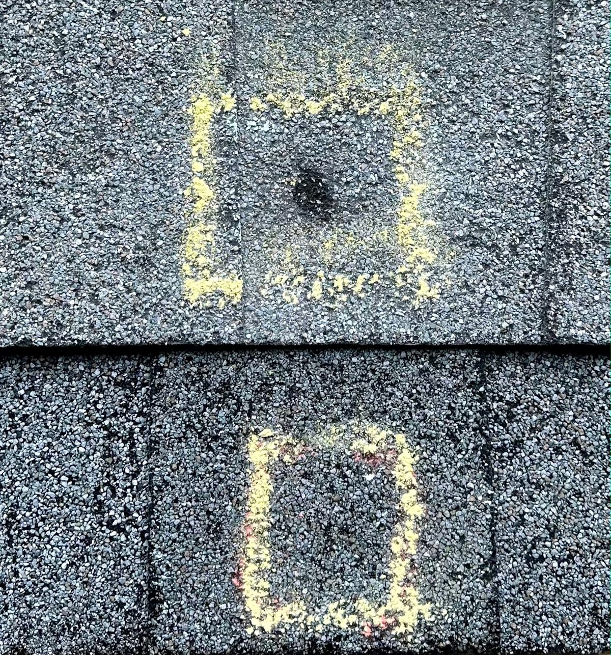 Hail cannon test two: untreated shingle half punctured, GoNano-treated half undamaged