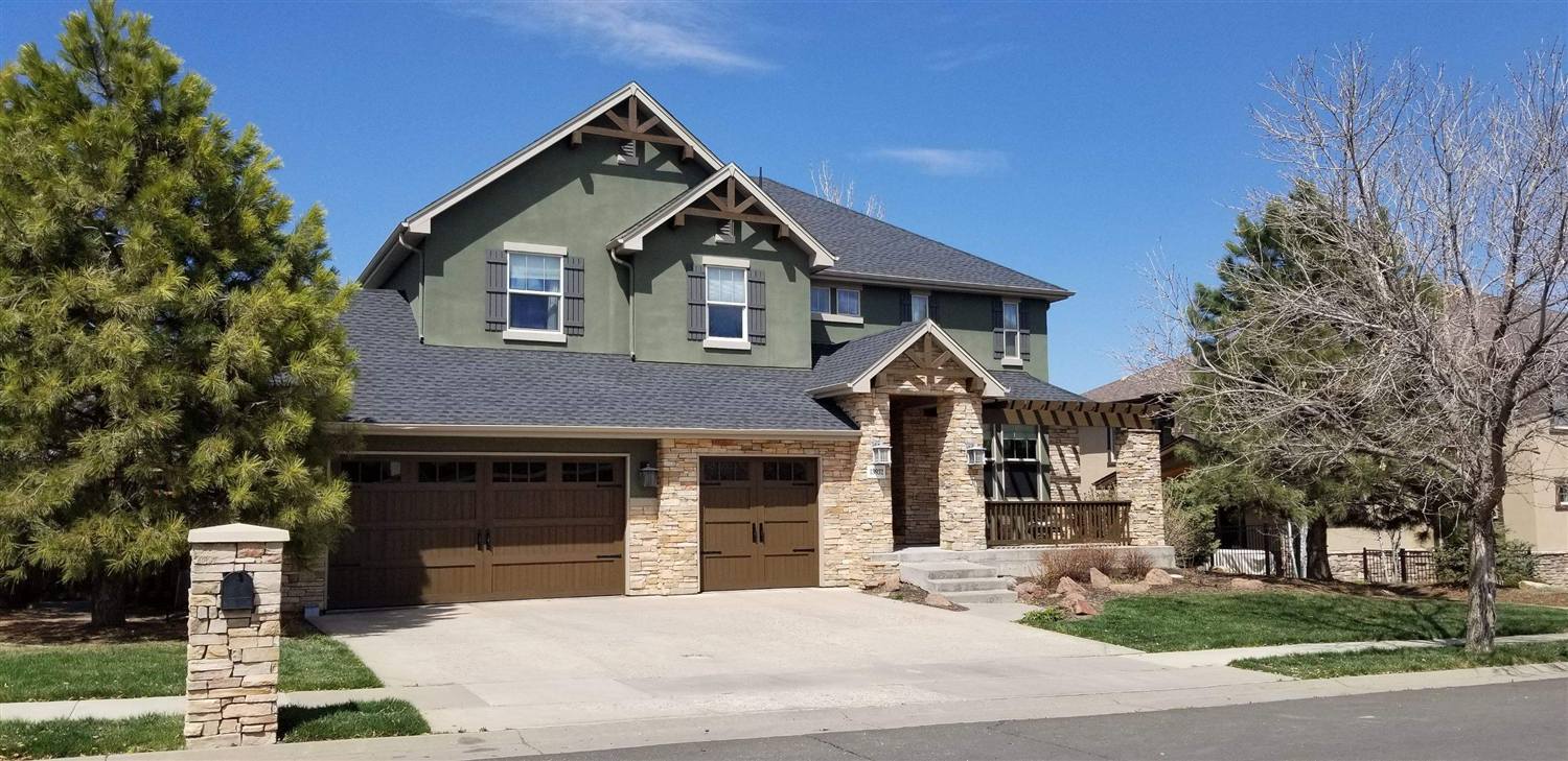 Finished GAF ArmorShield II Class 4 roof in charcoal installed by Bailey Roofing on a green craftsman two-story in Broomfield, Colorado, April 2020